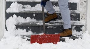 Person shoveling snow